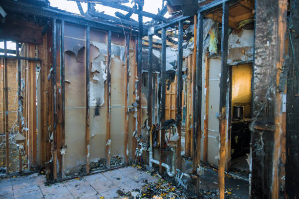 Professional Fire Damage Restoration technician working in Warsaw, KY